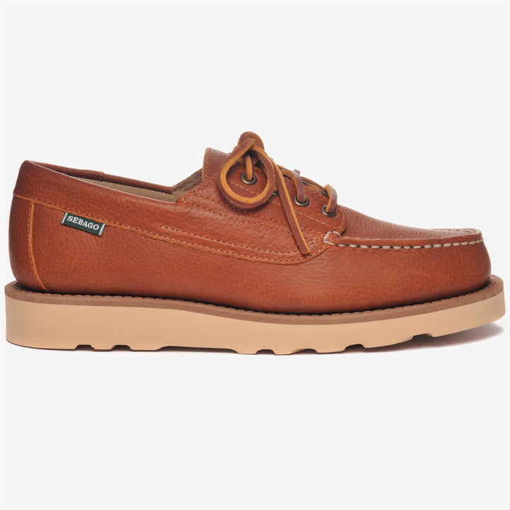 Mocassins marron cousus main pour homme, alliant confort et style 1