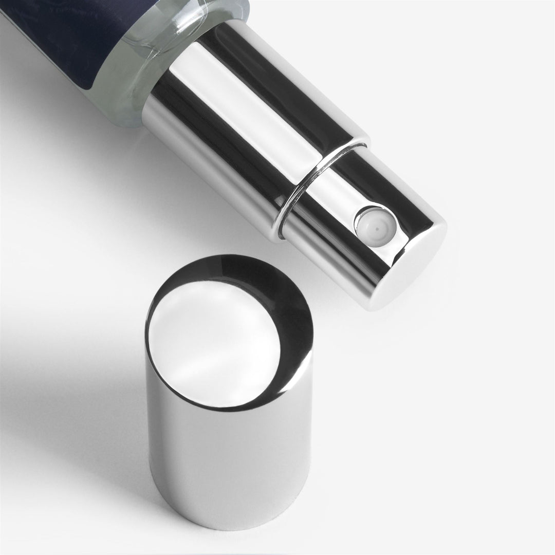 Parfum de voyage unisexe blanc aux épices des Caraïbes main