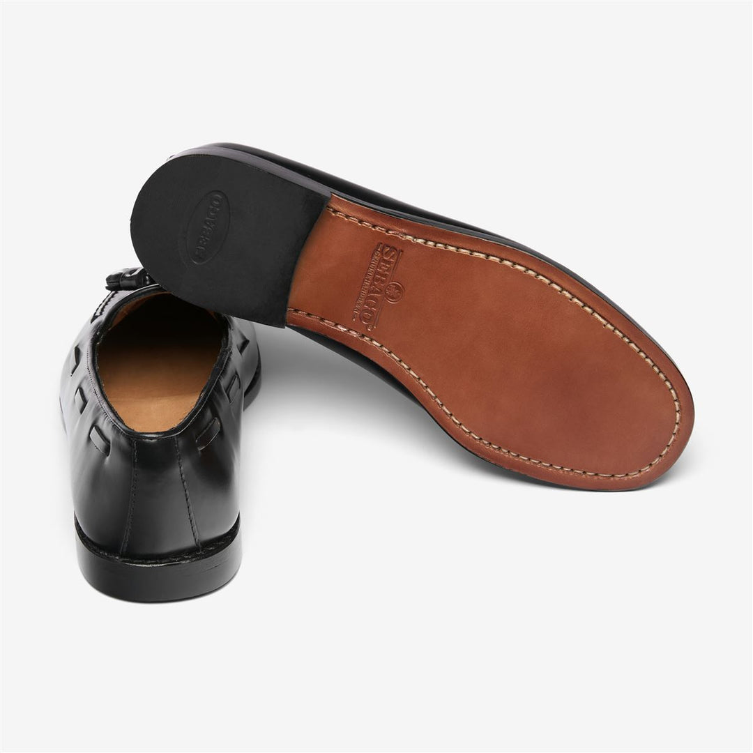 Schwarze Damen-Slipper aus Leder mit Schnürung und Quasten main