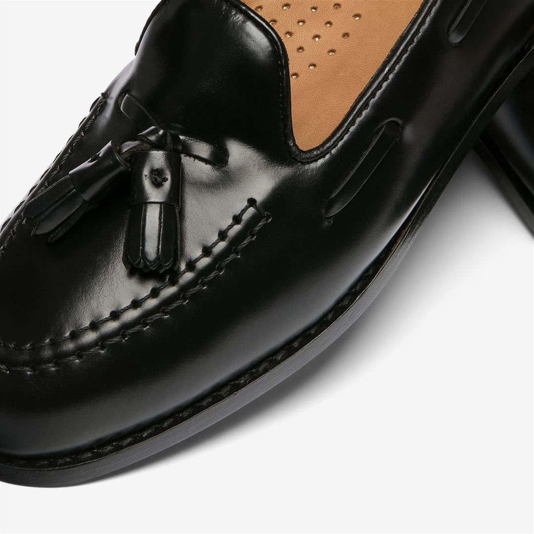 Schwarze Damen-Slipper aus Leder mit Schnürung und Quasten main